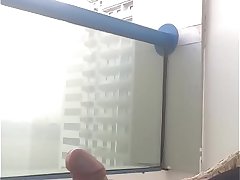 Cumshot on the balcony ... what a thrill ... in public view ... got caught ...