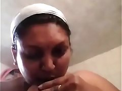 Tamil aunty in bathroom sucking her boobs