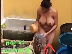 Desi wife open air shower shaving her hairy pussy